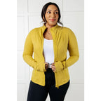 Our Pear-fectly Yellow Activewear Jacket is form-fitting and features a brushed microfiber material with mock neckline