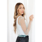 Our Pearl Diver Mesh Layering Top in Light Cyan is a stretchy long sleeve top embellished with faux pearls