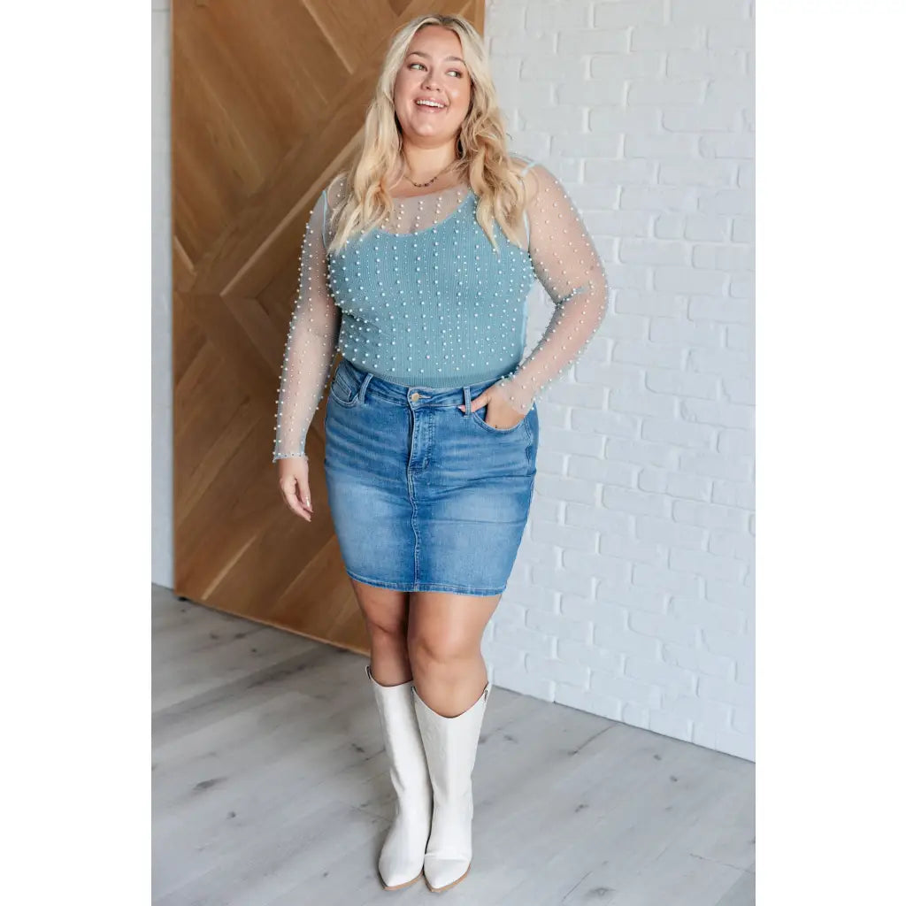Our Pearl Diver Mesh Layering Top in Light Cyan is a stretchy long sleeve top embellished with faux pearls