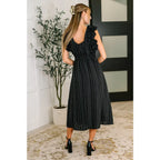 Ruffle My Pinstripes Midi Dress in black with white pinstripes. A chic plus size midi dress ruffle sleeves elastic