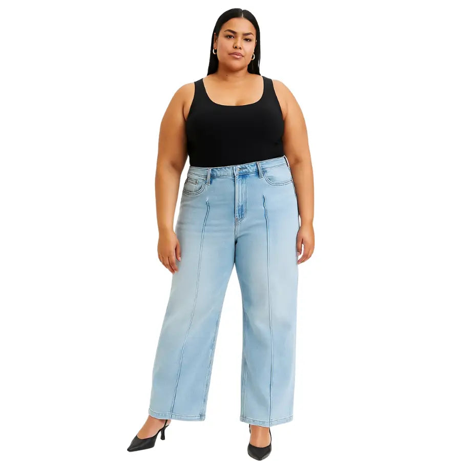 Chic pintuck detailed wide leg jeans with high waist stretch comfort and modern style. Elevated everyday stretchy denim