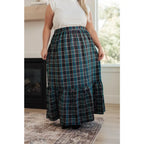 Fall in love with this plaid maxi skirt featuring a tiered hem and elastic back waist. A perfect plus size holiday look