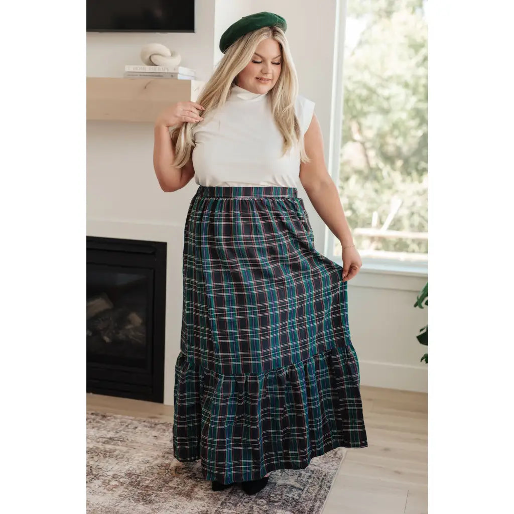 Fall in love with this plaid maxi skirt featuring a tiered hem and elastic back waist. A perfect plus size holiday look