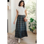Fall in love with this plaid maxi skirt featuring a tiered hem and elastic back waist. A perfect plus size holiday look