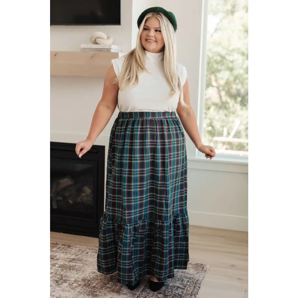 Fall in love with this plaid maxi skirt featuring a tiered hem and elastic back waist. A perfect plus size holiday look