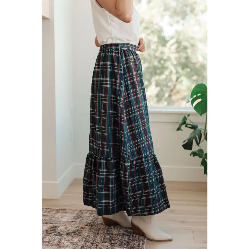 Fall in love with this plaid maxi skirt featuring a tiered hem and elastic back waist. A perfect plus size holiday look