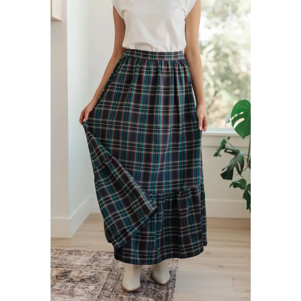 Fall in love with this plaid maxi skirt featuring a tiered hem and elastic back waist. A perfect plus size holiday look