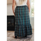 Fall in love with this plaid maxi skirt featuring a tiered hem and elastic back waist. A perfect plus size holiday look