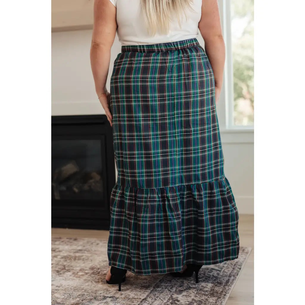 Fall in love with this plaid maxi skirt featuring a tiered hem and elastic back waist. A perfect plus size holiday look