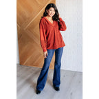 Textured caramel hoodie with v-neck elbow patches and an oversized fit. Fall boutique style plus size friendly for cozy