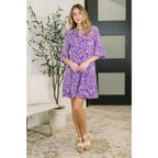 Shop this purple paisley mini dress in wrinkle resistant Bulgari fabric. Available standard and plus sizes