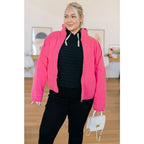Pink quilted jacket with zip front and mock neckline. Oversized fit plus size friendly. Mineral wash style perfect