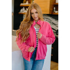 Pink quilted jacket with zip front and mock neckline. Oversized fit plus size friendly. Mineral wash style perfect