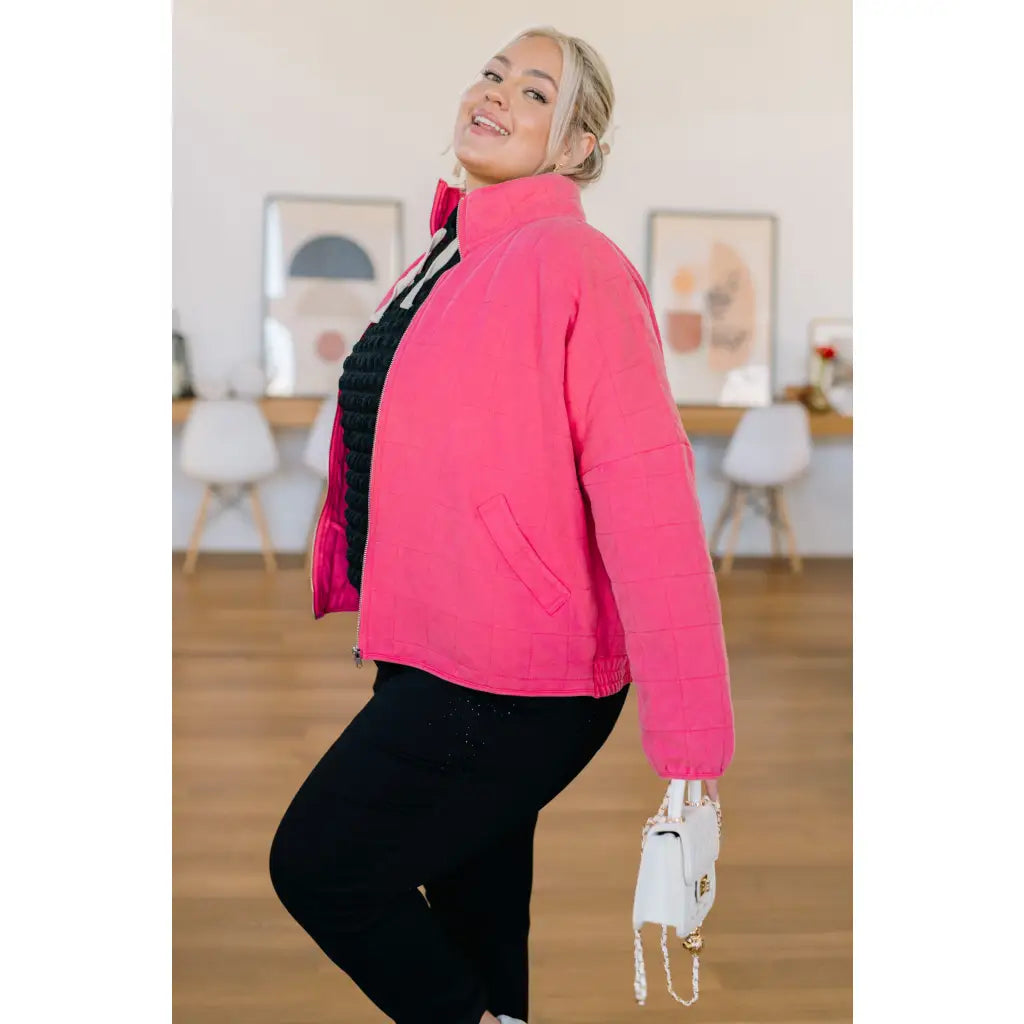 Pink quilted jacket with zip front and mock neckline. Oversized fit plus size friendly. Mineral wash style perfect