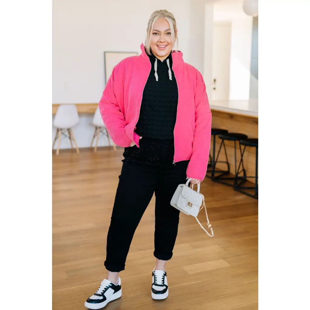 Pink quilted jacket with zip front and mock neckline. Oversized fit plus size friendly. Mineral wash style perfect