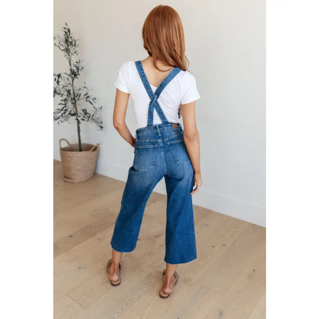 Step out in style with Priscilla High Rise Crop Wide Leg Denim Overalls from Judy Blue! These chic retro-style overalls