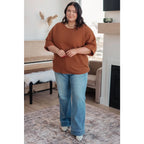 Lightweight oversized dolman knit short sleeve sweater in pumpkin spice. Perfect for Southern fall fashion. Plus size