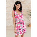 Wrinkle-resistant pink floral faux wrap dress with built-in shorts. Soft Bulgari fabric and flattering fit. Plus size