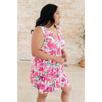 Wrinkle-resistant pink floral faux wrap dress with built-in shorts. Soft Bulgari fabric and flattering fit. Plus size