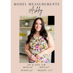 Wrinkle-resistant pink floral faux wrap dress with built-in shorts. Soft Bulgari fabric and flattering fit. Plus size