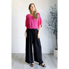 Be the life of party in our Rather Eventful Open Knit Top! Made from a cozy bright pink sweater knit this top has high