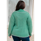 Our relaxed and cozy Ready for Surprises Cardigan features a soft green sweater knit exaggerated shawl collar contrast