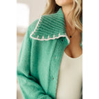 Our relaxed and cozy Ready for Surprises Cardigan features a soft green sweater knit exaggerated shawl collar contrast