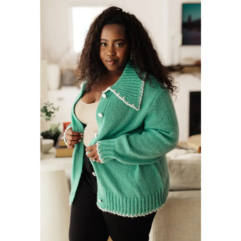 Our relaxed and cozy Ready for Surprises Cardigan features a soft green sweater knit exaggerated shawl collar contrast