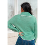 Our relaxed and cozy Ready for Surprises Cardigan features a soft green sweater knit exaggerated shawl collar contrast