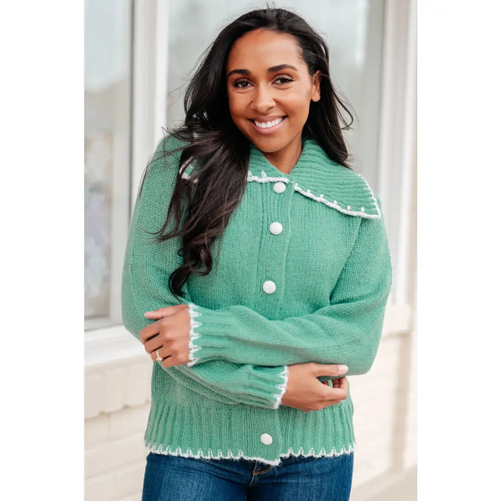 Our relaxed and cozy Ready for Surprises Cardigan features a soft green sweater knit exaggerated shawl collar contrast