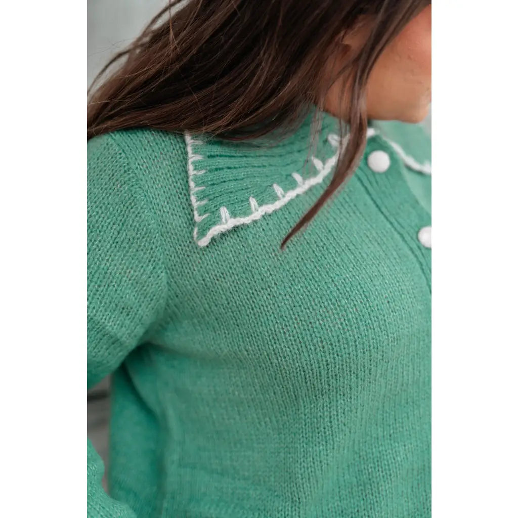 Our relaxed and cozy Ready for Surprises Cardigan features a soft green sweater knit exaggerated shawl collar contrast