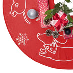 Red and white fleece tree skirt with mini dachshunds in cute bandanas. Cozy playful holiday decor for dog lovers. Sweet