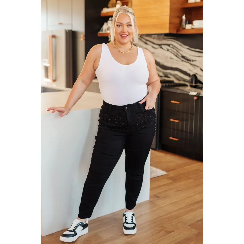 Unlock your unique style with our Reese Rhinestone Judy Blue Jeans in Black! Their high rise slim fit and 4 way stretch