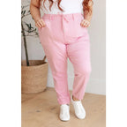 Slip into chic comfort with the Pretty in Pink Denim Joggers by Judy Blue. Boutique glam meets playful vibes — curvy