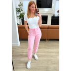 Slip into chic comfort with the Pretty in Pink Denim Joggers by Judy Blue. Boutique glam meets playful vibes — curvy