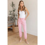 Slip into chic comfort with the Pretty in Pink Denim Joggers by Judy Blue. Boutique glam meets playful vibes — curvy