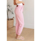 Slip into chic comfort with the Pretty in Pink Denim Joggers by Judy Blue. Boutique glam meets playful vibes — curvy