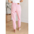 Slip into chic comfort with the Pretty in Pink Denim Joggers by Judy Blue. Boutique glam meets playful vibes — curvy