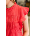 Coral flutter sleeve blouse with ruffle neckline and keyhole back. Mid-stretch knit in regular plus sizes SM-3XL. Soft