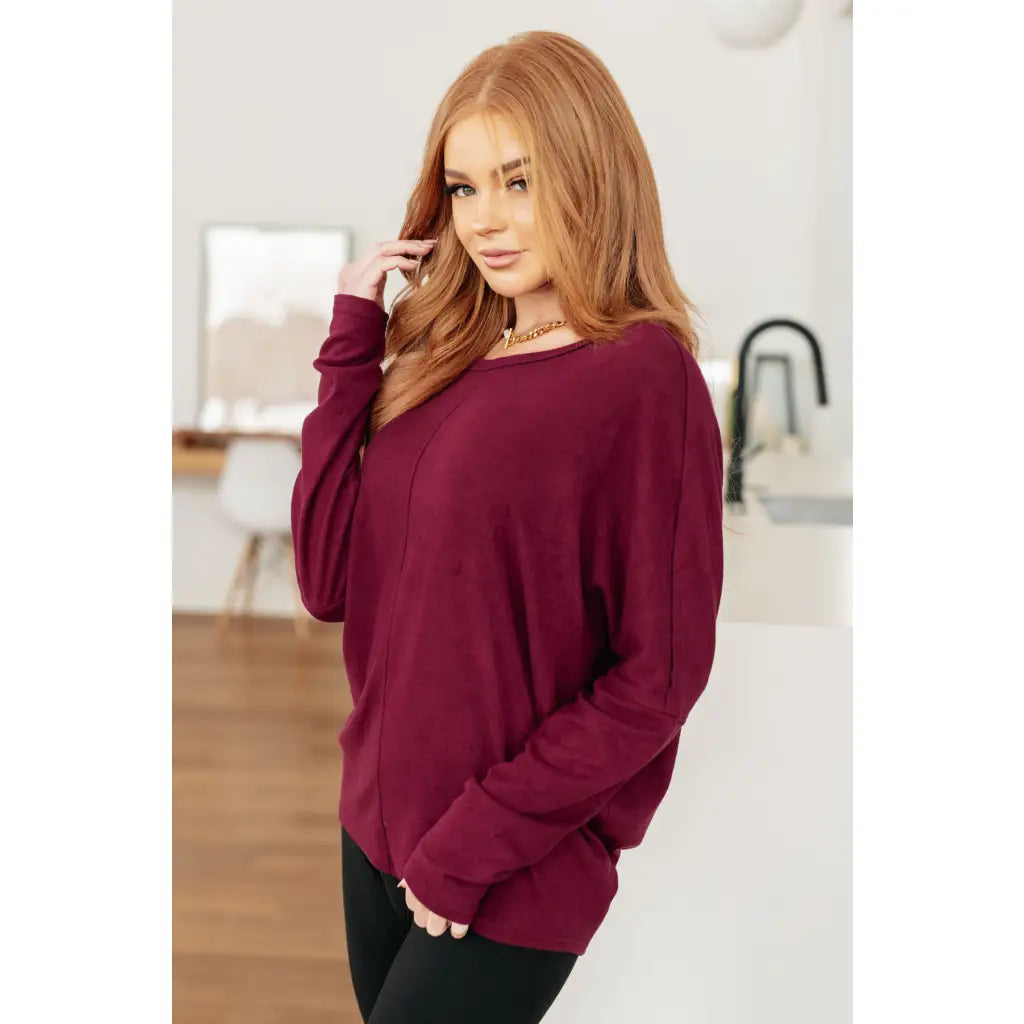 Oversized dolman top in wine jersey knit with relaxed fit and soft drape. Perfect plus size friendly everyday