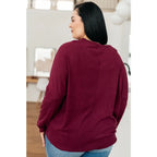 Oversized dolman top in wine jersey knit with relaxed fit and soft drape. Perfect plus size friendly everyday