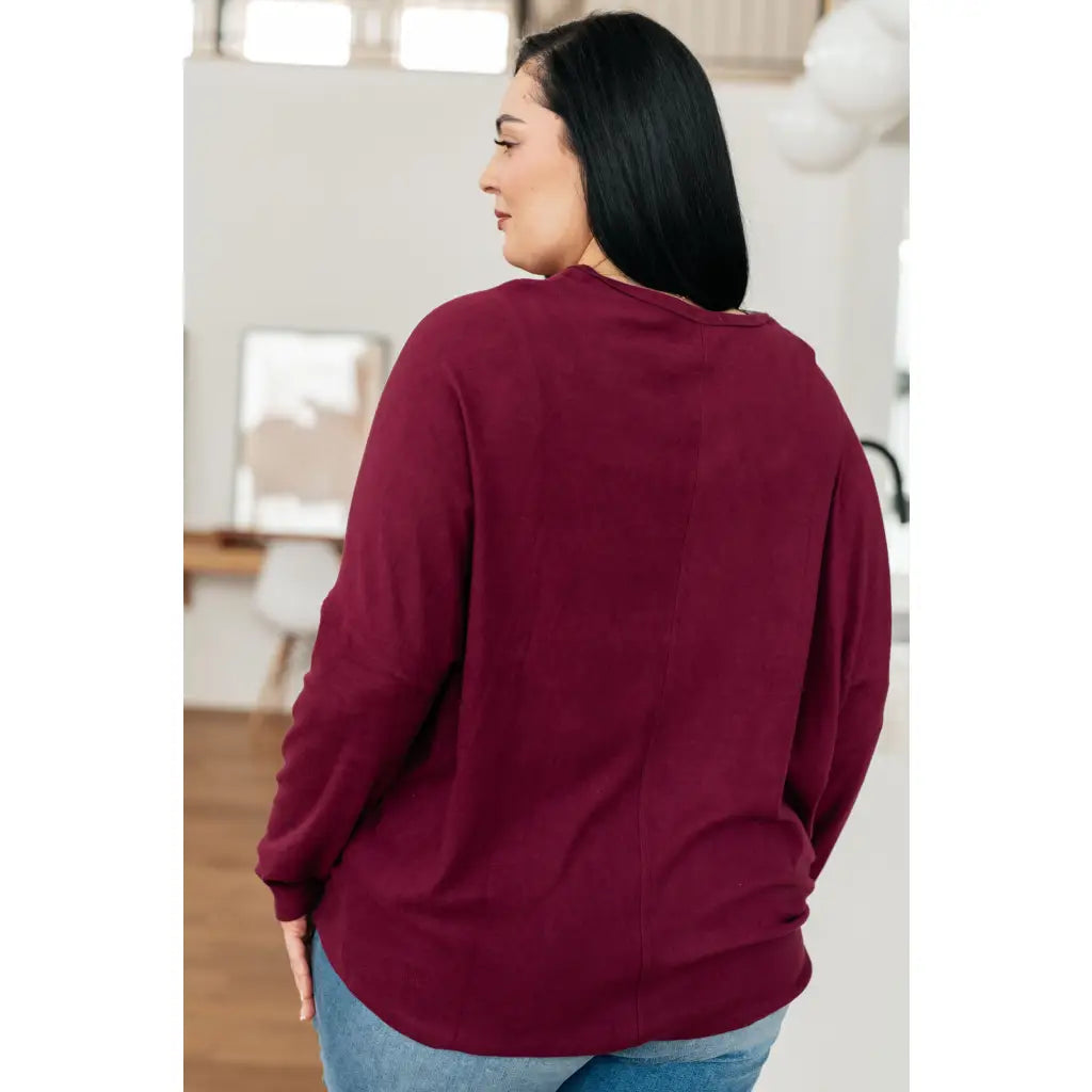 Oversized dolman top in wine jersey knit with relaxed fit and soft drape. Perfect plus size friendly everyday