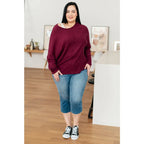 Oversized dolman top in wine jersey knit with relaxed fit and soft drape. Perfect plus size friendly everyday