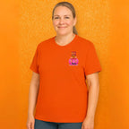 Pumpkin tee with Roxy Roo’s miniature dachshund silhouette paw print bow unisex fit and cozy comfort for fall pumpkin