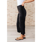 Get ready to rock stylishly with our Ryan Wide Leg Crop Judy Blue Jeans in Black! The stretchy denim features