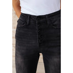 Get ready to rock stylishly with our Ryan Wide Leg Crop Judy Blue Jeans in Black! The stretchy denim features