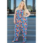 Turn heads in the vibrant Seek Me Out Jumpsuit. Plus size-friendly bold print adjustable straps and flattering fit.