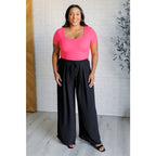 Our gorgeous black Send it On Wide Leg Pants feature a crinkle woven fabric cased elastic waistband functional