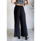 Our gorgeous black Send it On Wide Leg Pants feature a crinkle woven fabric cased elastic waistband functional