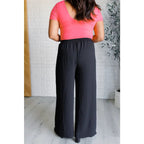 Our gorgeous black Send it On Wide Leg Pants feature a crinkle woven fabric cased elastic waistband functional